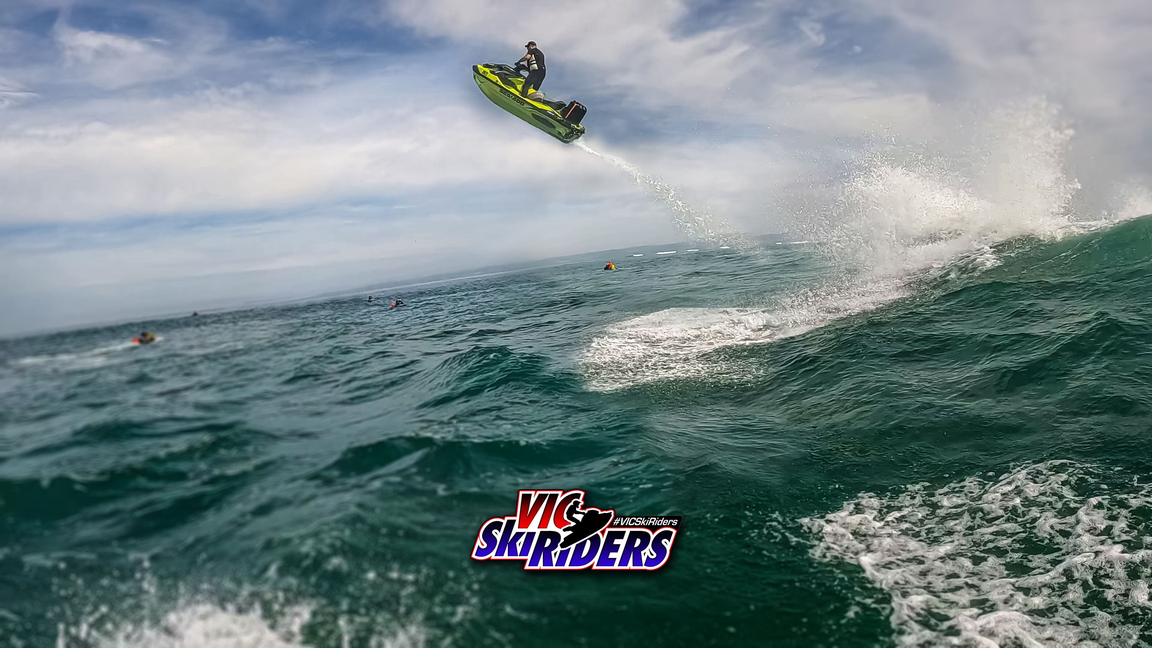 Rider launching a Sea-Doo high off a wave during a ride day session