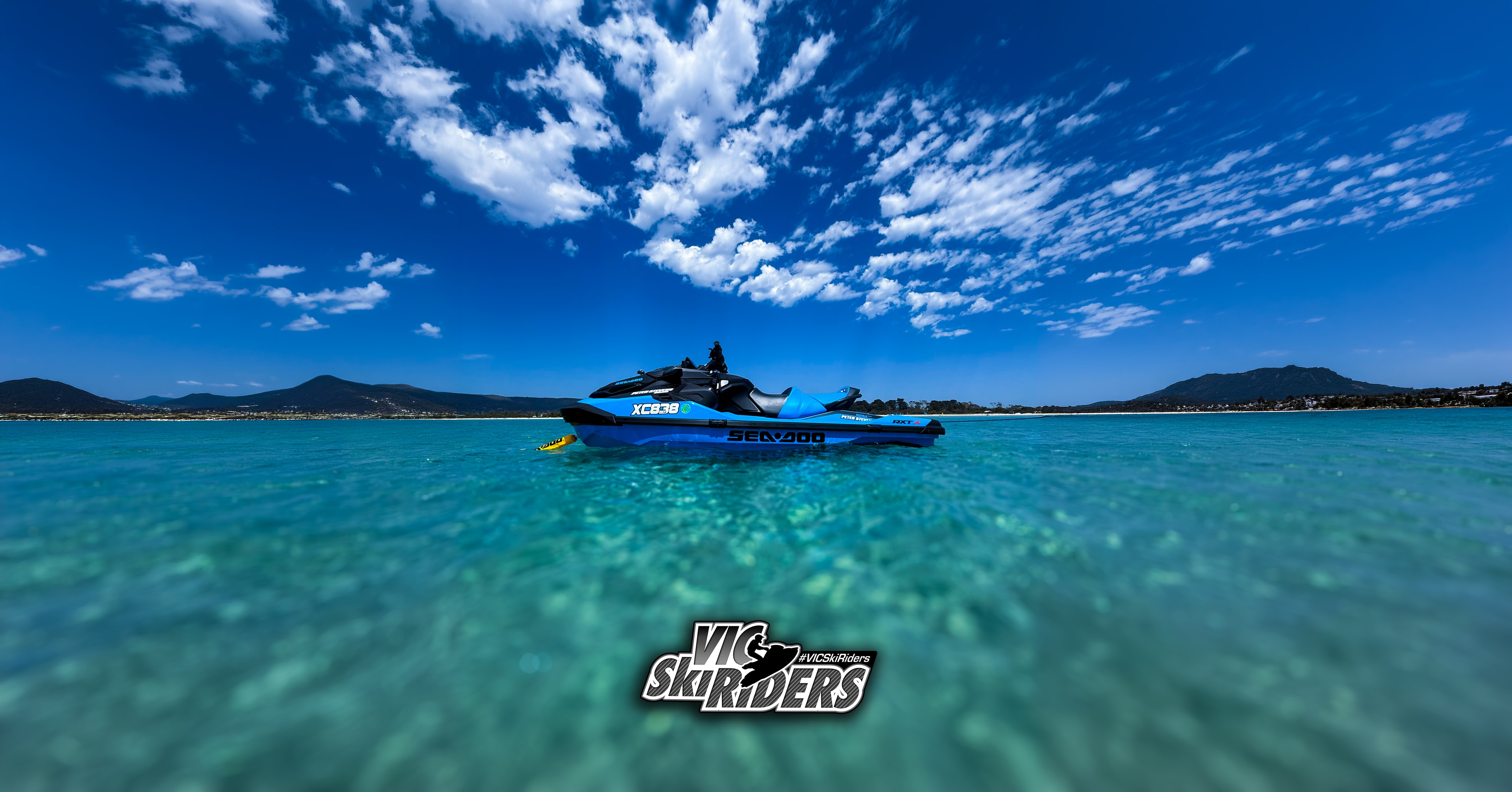 Group of riders on the water